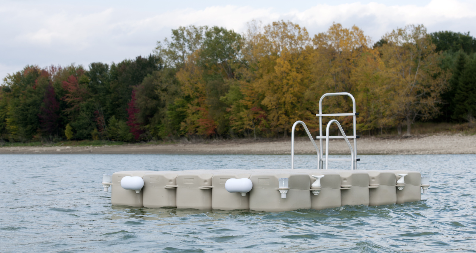 Jetfloat Raft with ladder on lake with autumn trees